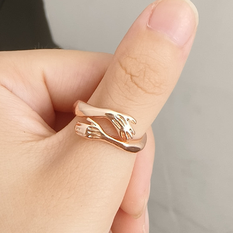 Simple Fashion Hands Hug Ring (50% OFF)