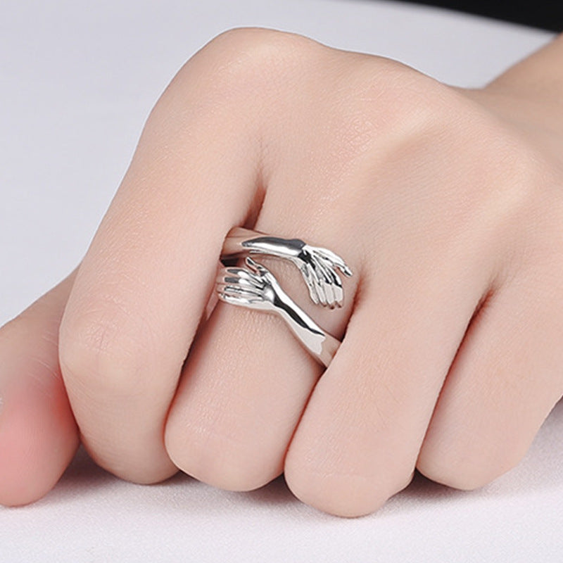 Simple Fashion Hands Hug Ring (50% OFF)